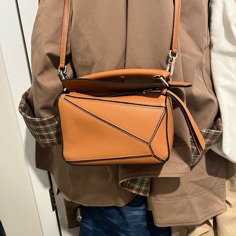 Price firm-Loewe mini puzzle